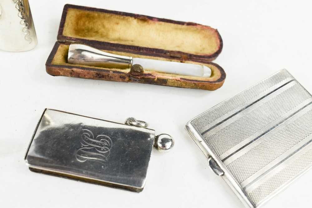 A group of silver smokers accessories including two vintage cigarette holders, two match box - Image 3 of 3