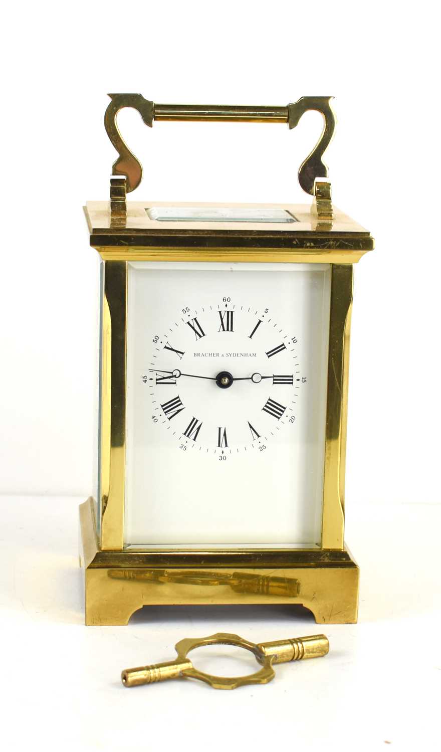 A Bracher & Sydenham 8 day carriage clock, the white enamel dial with roman numerals, the movement