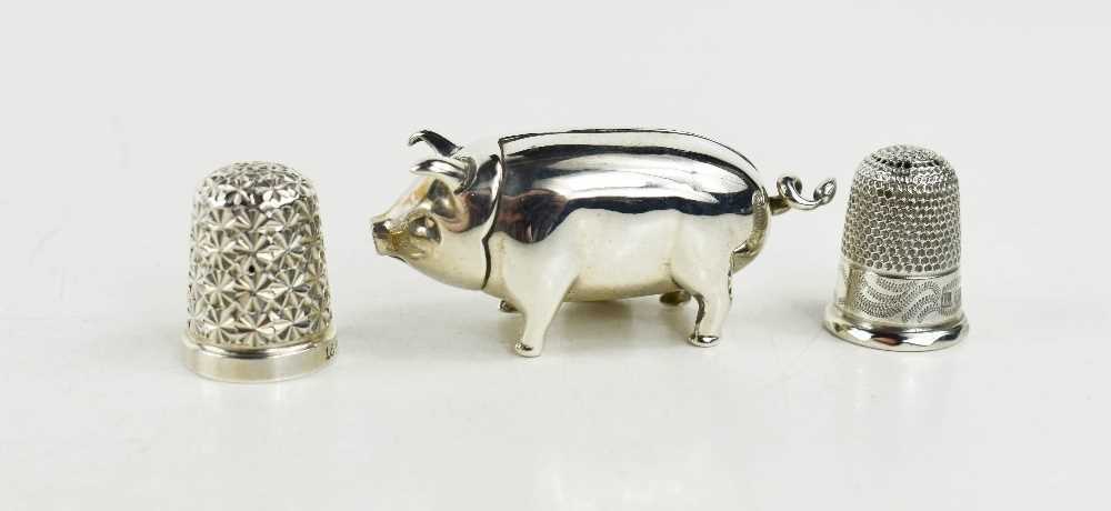 A group of silver sewing accoutrements including a pig tape measure with tail winder, hallmarked - Image 2 of 2