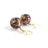 A pair of early 19th century gold ball earrings, the ball drops inlaid with gold flowers, and fish