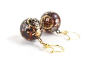 A pair of early 19th century gold ball earrings, the ball drops inlaid with gold flowers, and fish