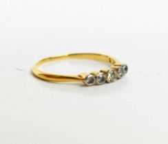 A 9ct gold and diamond ring, set with five old cut graduated diamonds, size M, 1.35g.