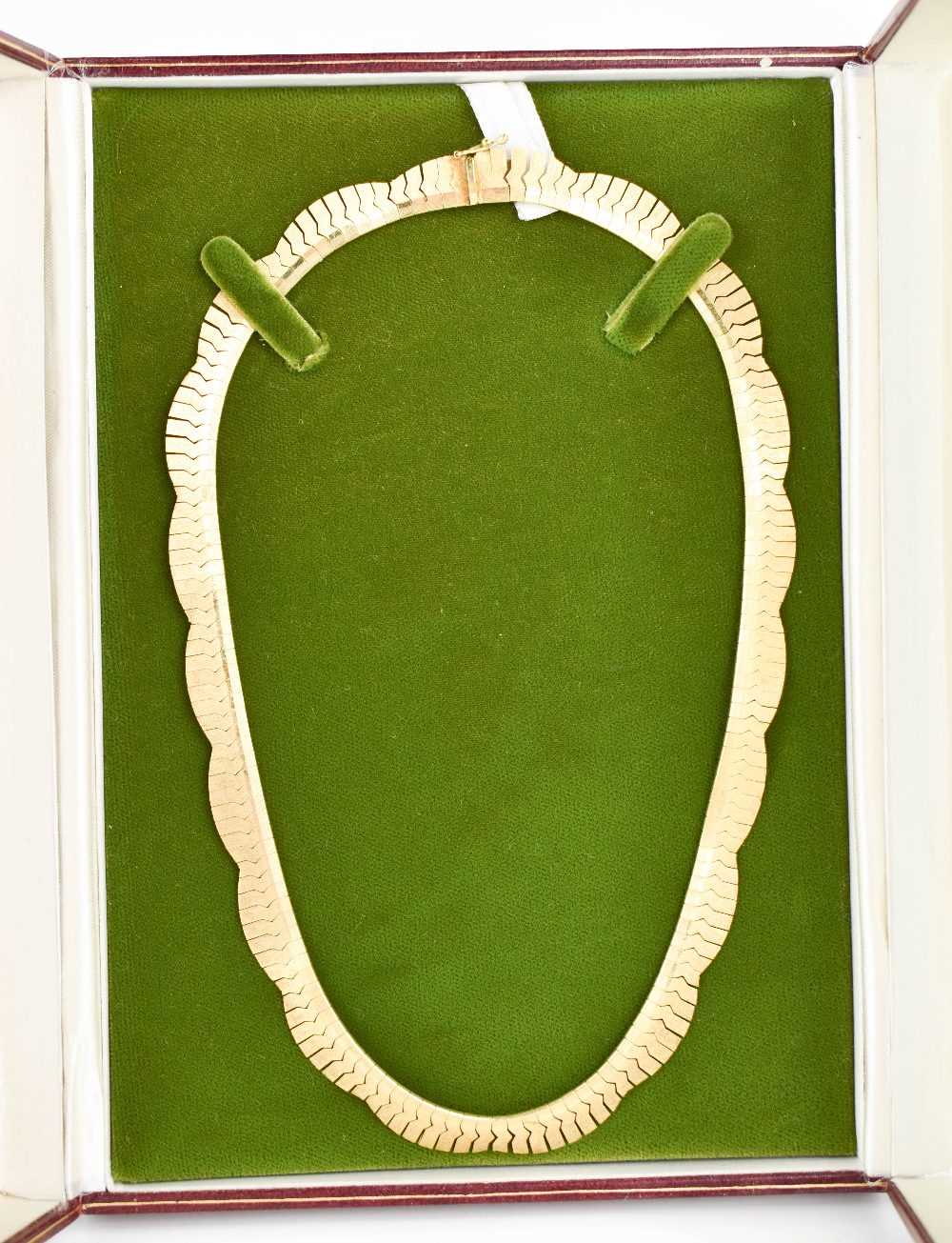 An 18ct gold necklace, composed of undulating fronds, with sliding clasp and safety link, with - Image 2 of 2