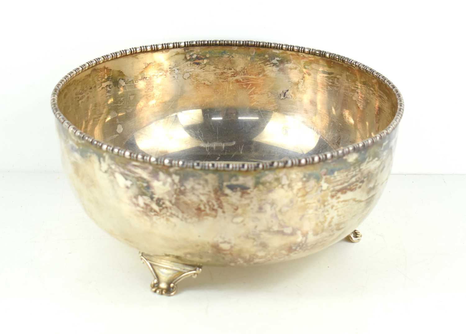 A white metal fruit bowl with gadrooned rim, on three cast feet, hallmark to underside, 23cm - Image 2 of 3