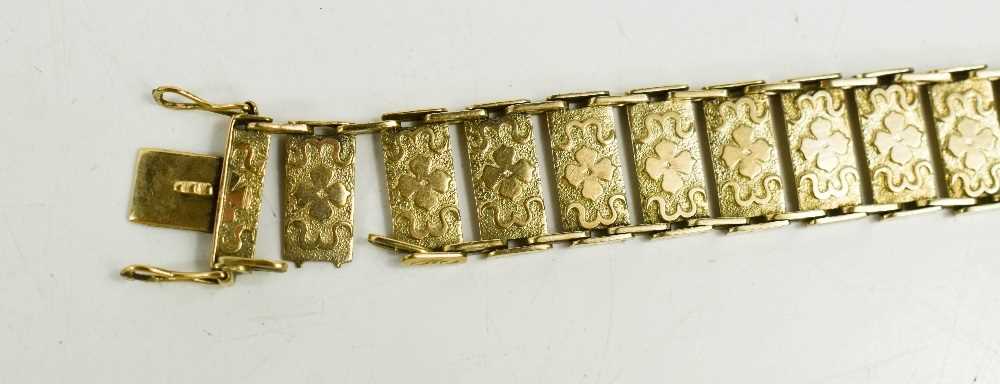 A 9ct gold twenty eight panelled bracelet, each rectangular panel with engraved floral decoration, - Image 3 of 3