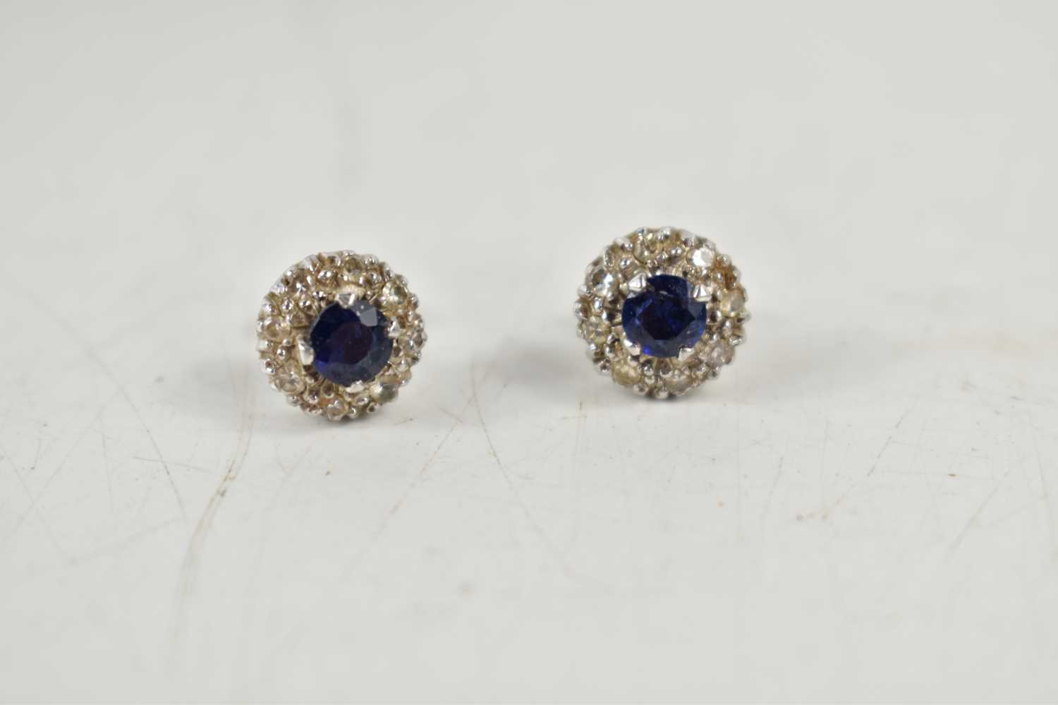 A pair of sapphire and diamond earrings, each set with a central sapphire, approximately 4.4mm - Image 4 of 4