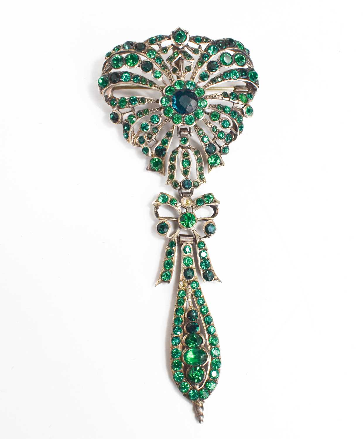 A 19th century French silver and green paste articulated bodice brooch pin, the brooch having a
