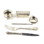 A group of silver to include a pocket watch case, fork, silver handled knife, mustard pot, silver