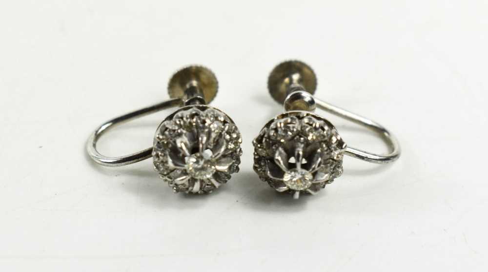 A pair of 9ct gold and diamond flowerhead earrings with screw on backs, 4.19g. - Image 3 of 3