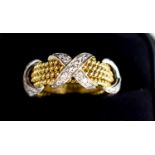 A Tiffany & Co by Schlumberger Studios 18ct gold and diamond ring, composed of four yellow gold