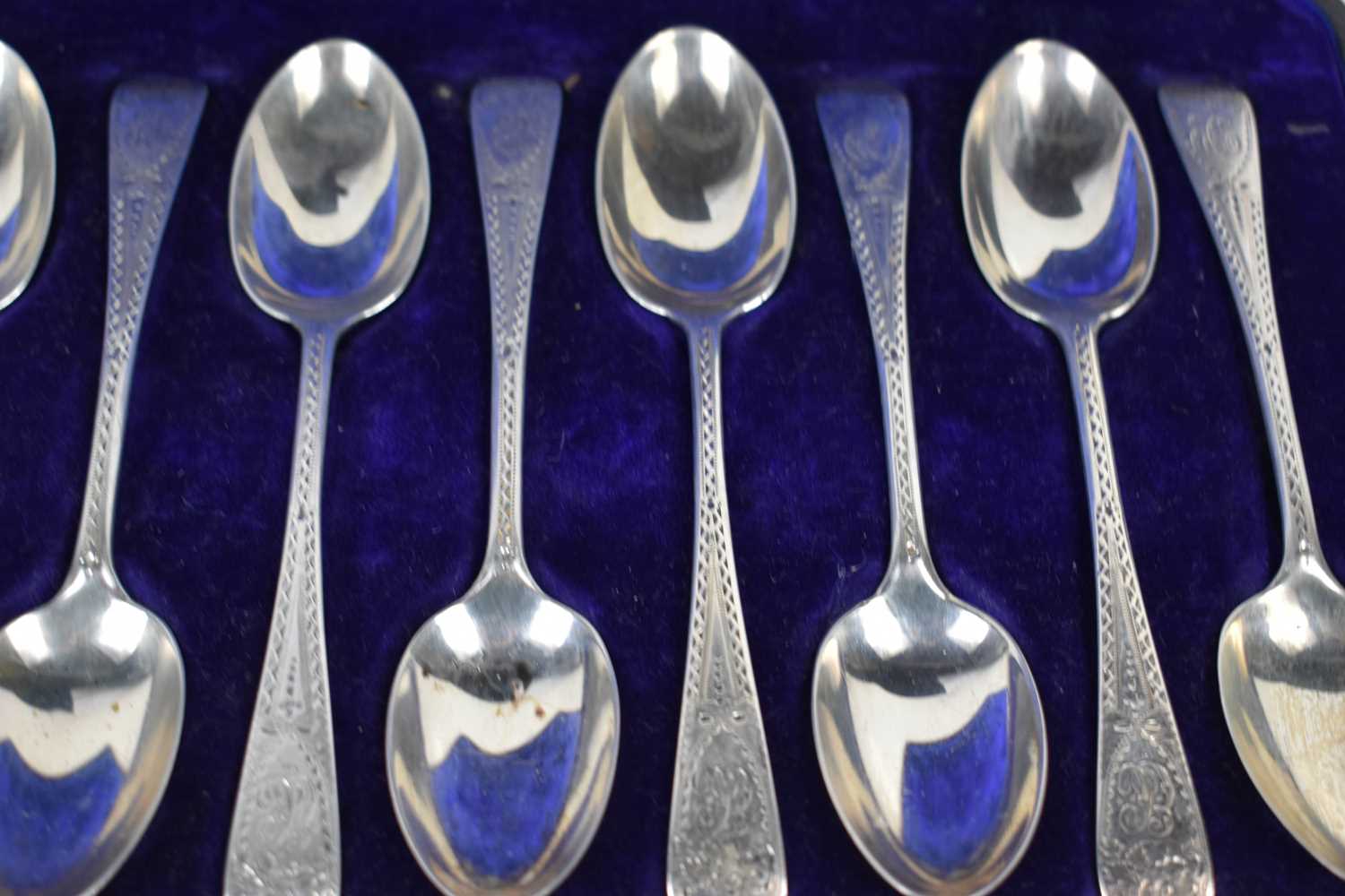A set of twelve silver teaspoons, London 1901, engraved with decoration to the handles and - Image 2 of 2
