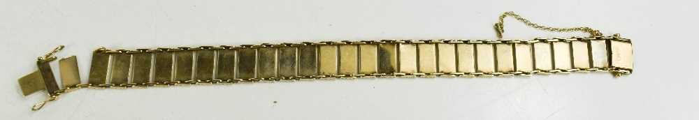 A 9ct gold twenty eight panelled bracelet, each rectangular panel with engraved floral decoration, - Image 2 of 3