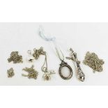 A group of silver jewellery comprising five silver chains, a past locket in the Victorian style,