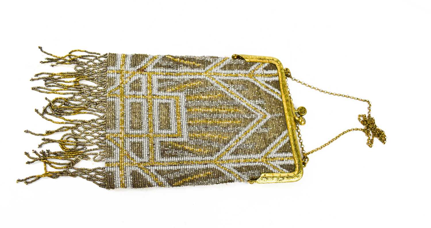 A vintage Art Deco beaded evening bag, with silvered, steel and gold coloured metalic beads in