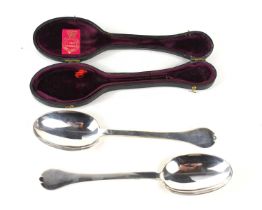 A pair of Britannia silver Trefid spoons, hallmarked RB&S, with date letter for 1912, in original