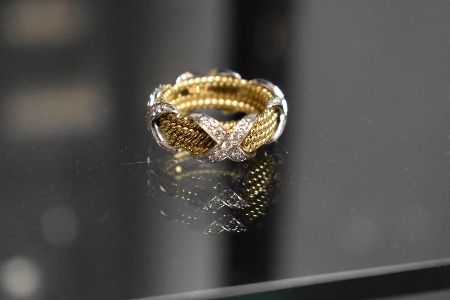 A Tiffany & Co by Schlumberger Studios 18ct gold and diamond ring, composed of four yellow gold - Image 13 of 14