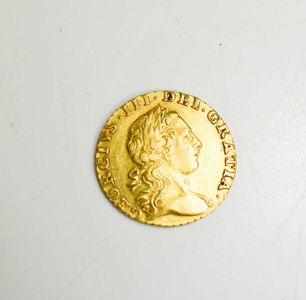 A George III quarter guinea 1762, 2.1g. - Image 2 of 2