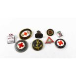 A group of mid 20th century and later badges, comprising thee German red cross badges, one for the
