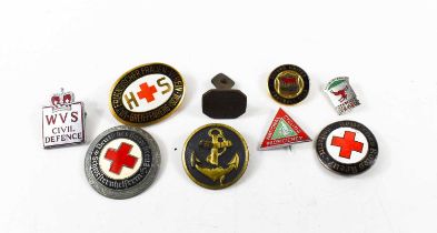 A group of mid 20th century and later badges, comprising thee German red cross badges, one for the