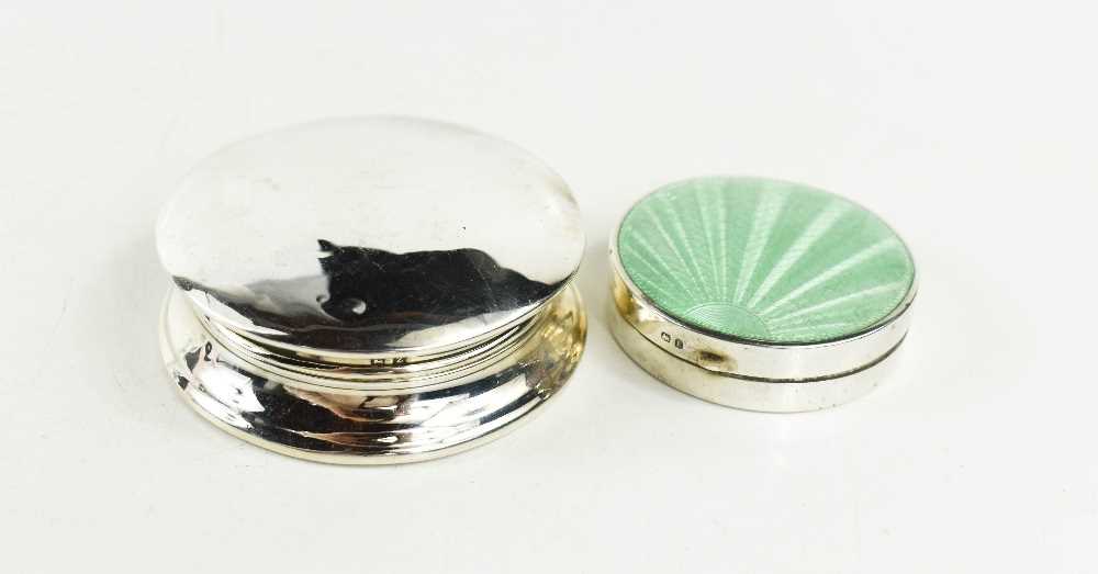 A silver and enamelled vintage compact, with sunburst pale green guilloche enamel to the lid,