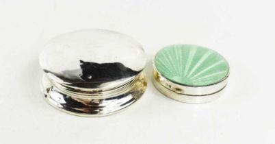 A silver and enamelled vintage compact, with sunburst pale green guilloche enamel to the lid,