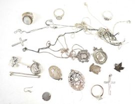 A group of silver jewellery to include a Prince Charles & Lady Diana pendant, fob medal pendants,