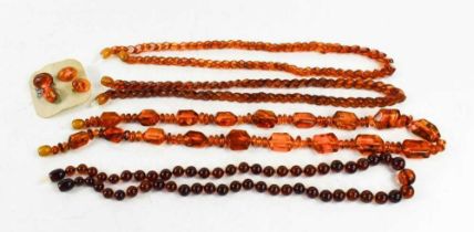 A group of Baltic amber necklaces, comprising angular beads, 52cm long, and two strings of
