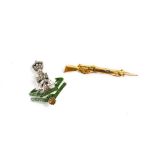 A 9ct gold rifle sweetheart brooch, 1.45g including steel pin and a sweetheart brooch for the The