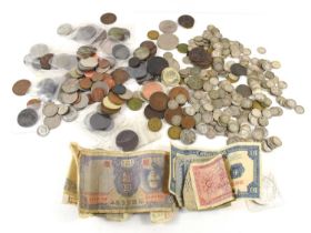 A group of GB and worldwide coins to include a quantity of silver threepences, banknotes, tokens and