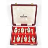 A cased set of six Walker & Hall silver spoons in the Kings pattern, 5.2toz.