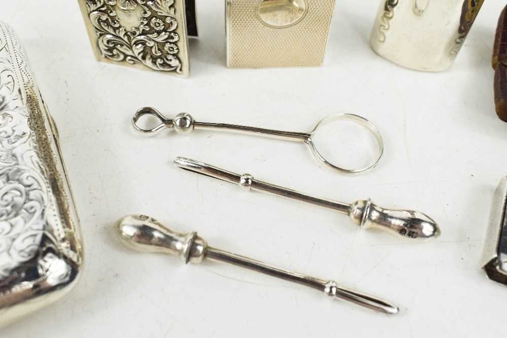 A group of silver smokers accessories including two vintage cigarette holders, two match box - Image 2 of 3