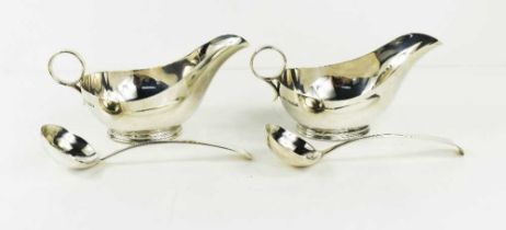A pair of Georgian silver sauce boats and spoons, London 1804, of elegant design, 17toz.