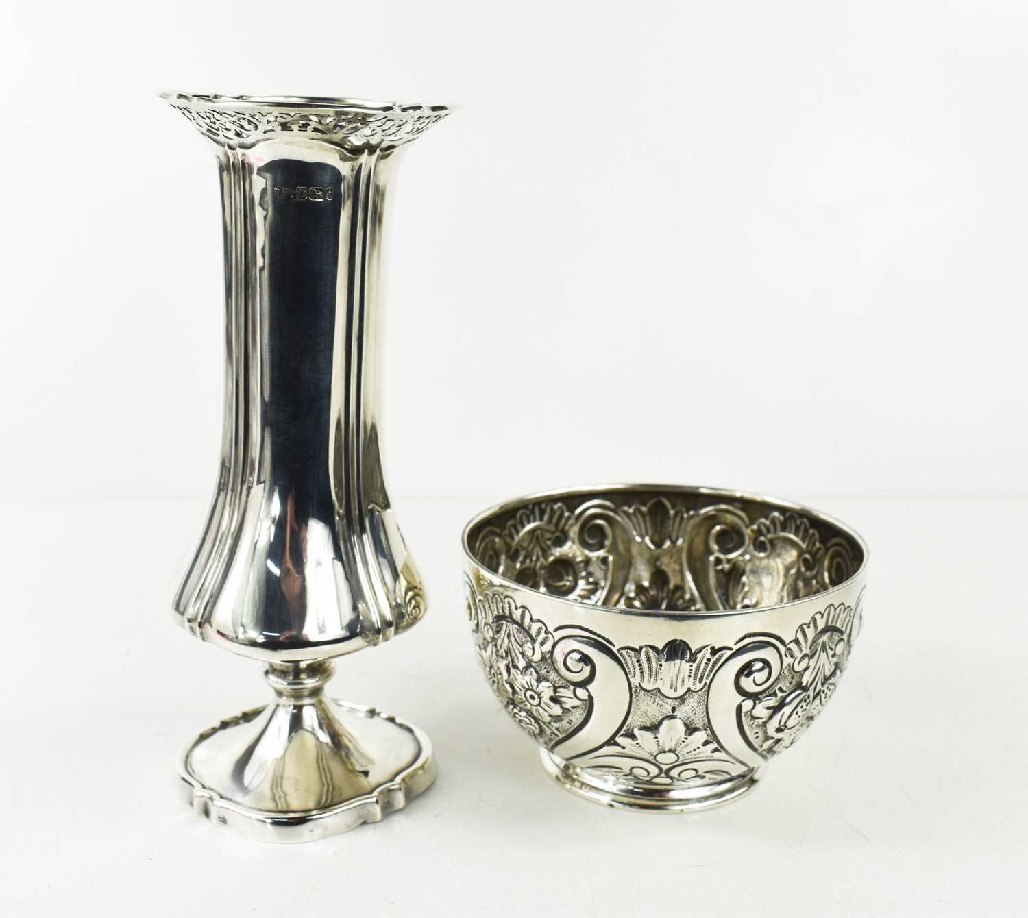 A Victorian silver sugar bowl, decorated throughout with flowers and pomegranates, monogram