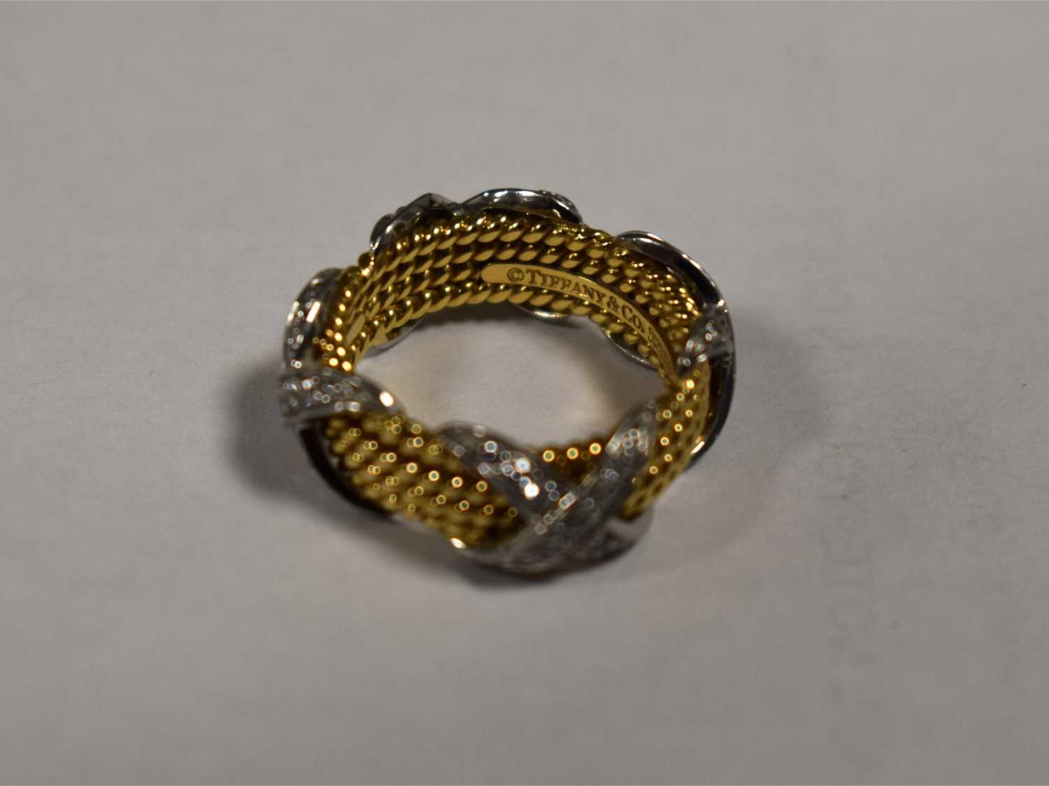 A Tiffany & Co by Schlumberger Studios 18ct gold and diamond ring, composed of four yellow gold - Image 14 of 14