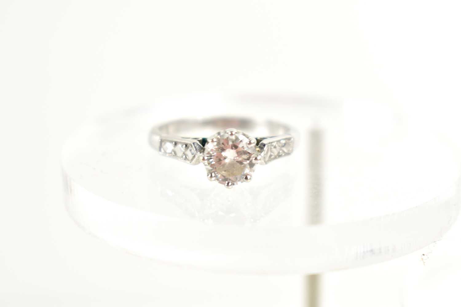 A platinum and diamond solitaire ring, the central stone of approximately 6.2mm diameter, 0.9ct, - Image 2 of 3