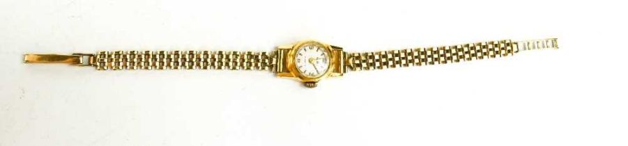 An 18ct gold cased lady's cocktail watch, with 9ct gold bracelet strap, total weight including