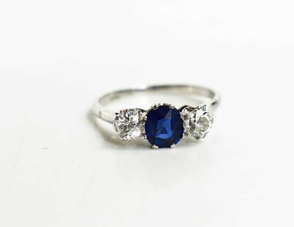 An 18ct white gold, diamond and sapphire ring, the two diamonds 0.3ct each, the cornflower blue - Image 3 of 4