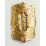 A US Civil War gold sash buckle, tested to at least 14ct, hand engraved with scrollwork and