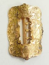 A US Civil War gold sash buckle, tested to at least 14ct, hand engraved with scrollwork and