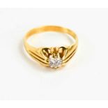 An 18ct gold and diamond ring, size R, the brilliant cut diamond approximately ½ct, 5.39g.