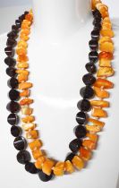 A string of vintage butterscotch amber beads, of polished angular form, 81.1g, together with a