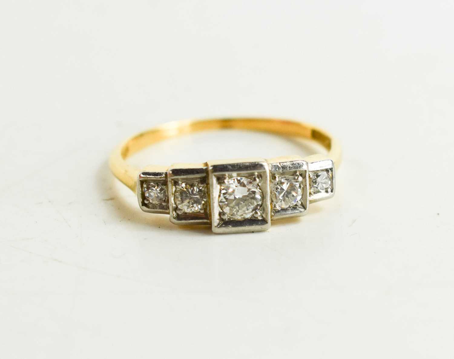 An 18ct gold, diamond and platinum ring, the five graduated brilliant cut diamonds in staggered - Image 2 of 2