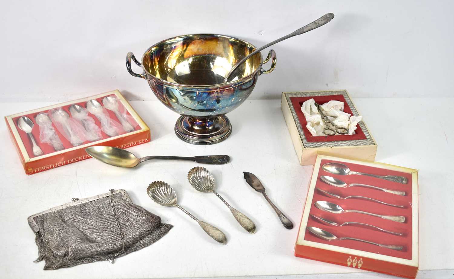 A group of silver and plated items to include two Bailey and Co silver serving spoons, silver fish