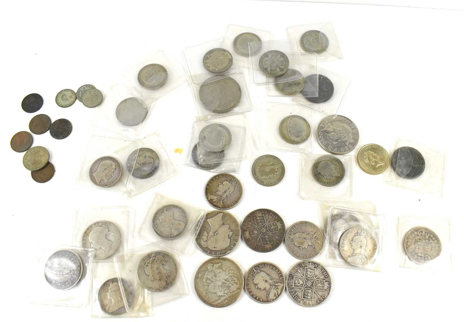 A collection of coins to include silver shillings, Queen Victorian crown dated 1844, florin 1887,