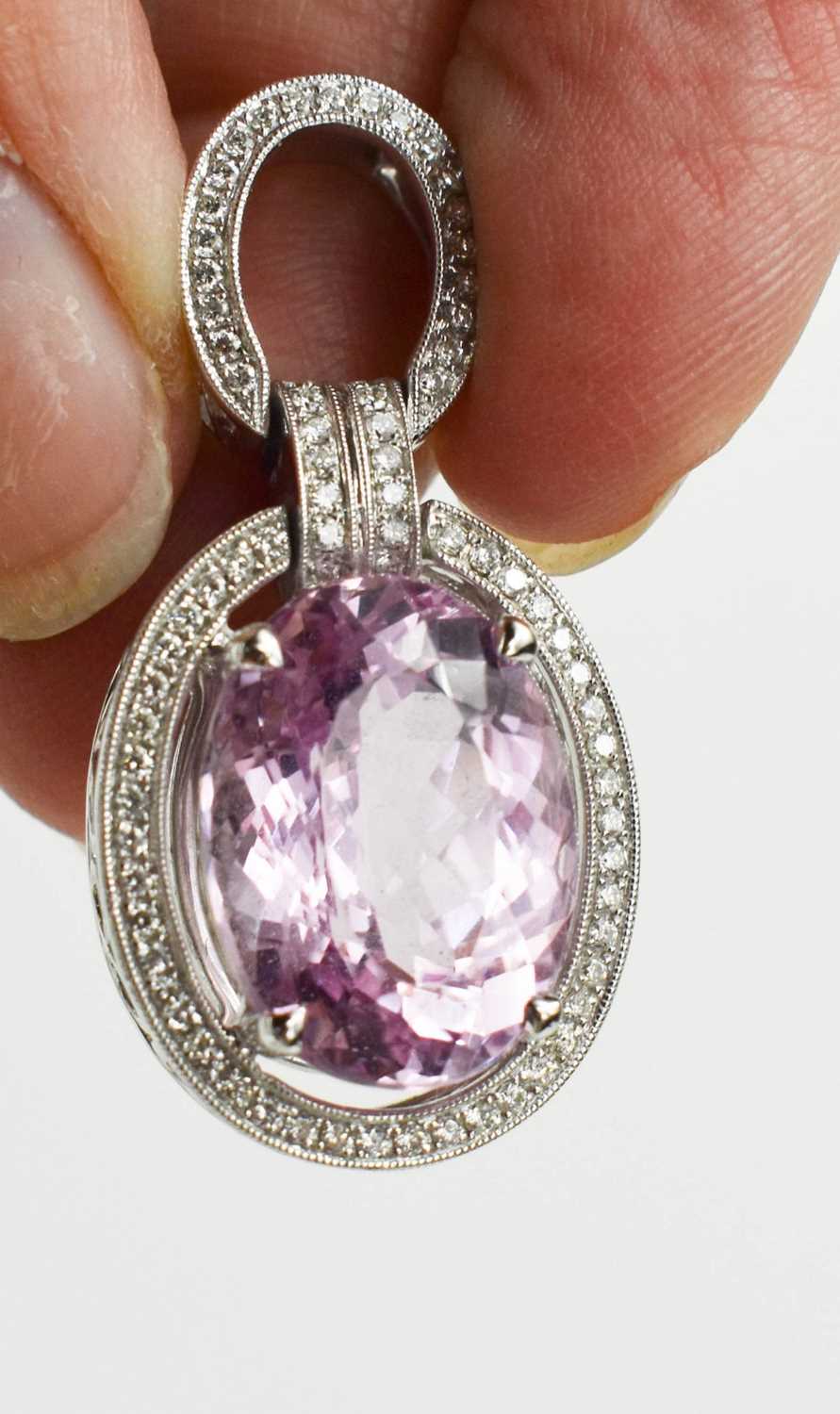 A Kunzite and diamond brilliant pendant set in 18ct white gold by Forum Design, the large oval cut - Image 3 of 3