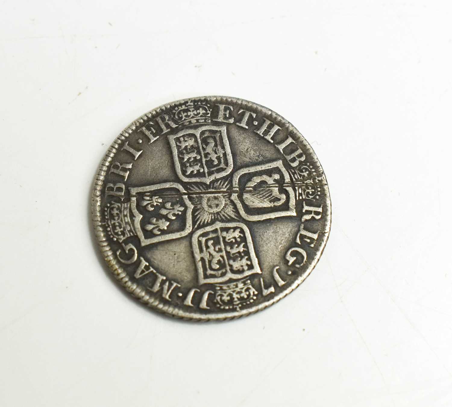 A Queen Anne silver milled shilling dated 1711. - Image 2 of 2