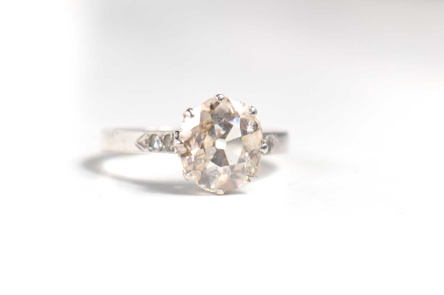 An old brilliant cut solitaire diamond and platinum ring, the diamond of very slightly uneven - Image 6 of 7