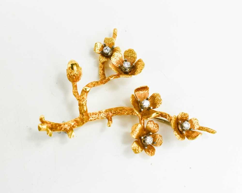 An 18ct gold and diamond set branch & blossom form brooch, likely by Kim Styles (incomplete makers