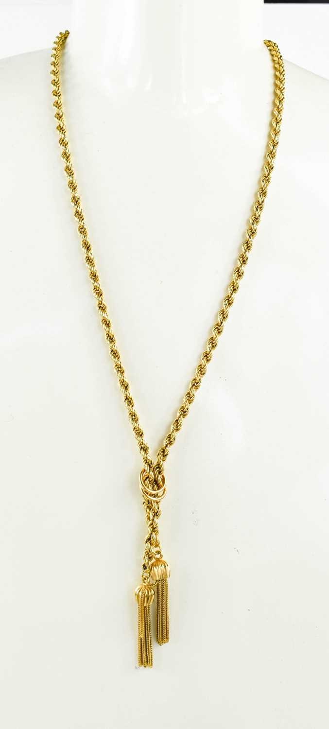 An 18ct gold double rope chain necklace with twin tassel drop and pierced clasp, 35.4g.