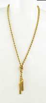 An 18ct gold double rope chain necklace with twin tassel drop and pierced clasp, 35.4g.